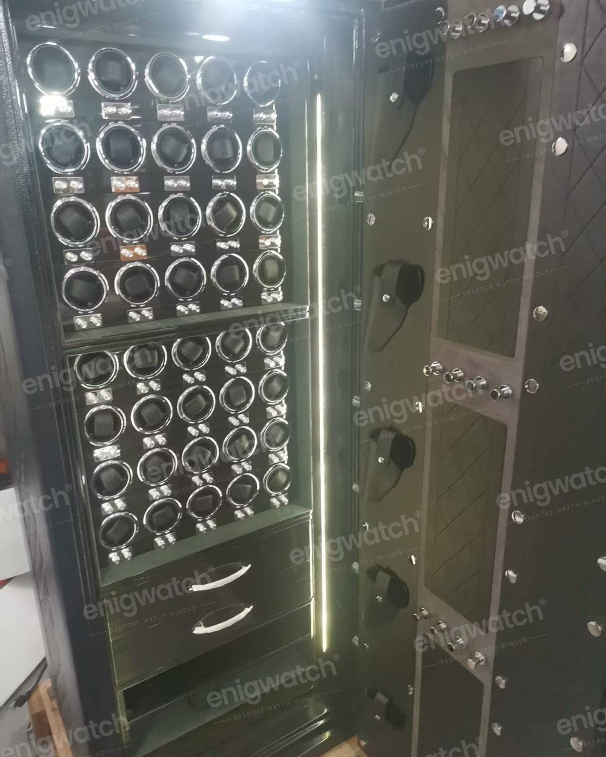Two grids of chrome winder collars set into a steel door