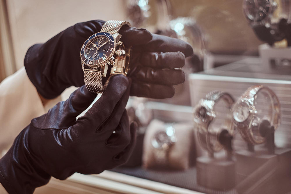Person holding a luxury-style watch, showing how to choose the right alternative watches by design and quality.