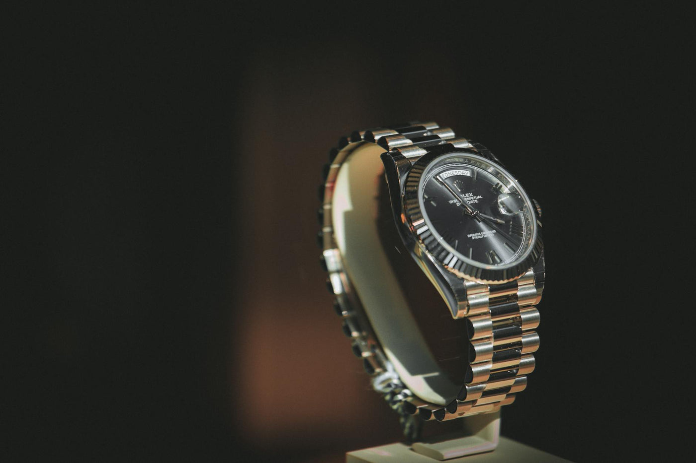 A close-up shot of a luxury watch with a metallic bracelet, showcasing elegance and precision.