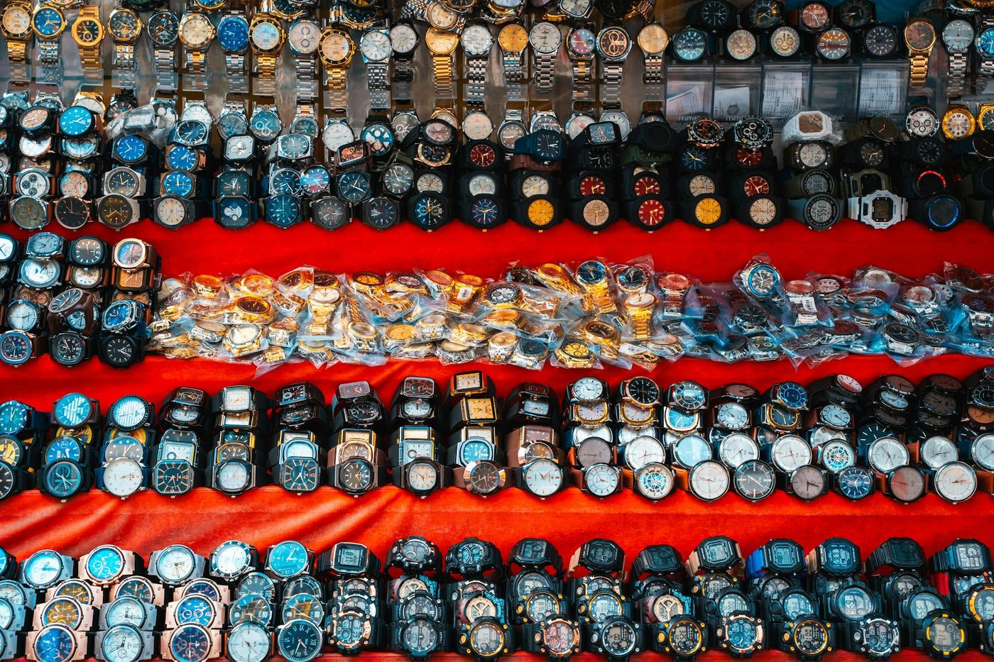 Colorful wristwatch display at a vibrant street market in Colombo, Sri Lanka.